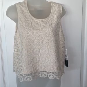 NWOT - tag lost during packing/moving houses. It is still NEW and not worn.